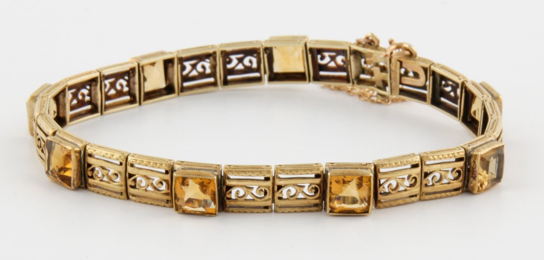 Antique Gold and Citrine Bracelet: Antique Gold and Citrine Bracelet with openwork links and square-cut Citrines. 7"L (18 cm). 16.8 g. Since 1937, the The Silver Shop of Princeton, NJ was located at 59 Palmer Square West.