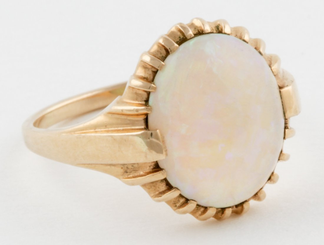 14K Gold and Opal Ring: 14K Gold and Opal Ring. Size 8.5. 6.2 g. Since 1937, the The Silver Shop of Princeton, NJ was located at 59 Palmer Square West.