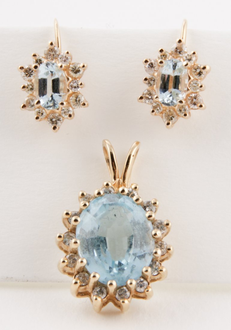 14K Gold Diamond and Blue Topaz Ensemble: Earrings with Matching Pendant. 14K Gold Diamond and Blue Topaz Ensemble.Size: .75" x .5" (2 x 1 cm, pendant). 7.3 g. Since 1937, the The Silver Shop of Princeton, NJ was located at 59 Palmer Square W