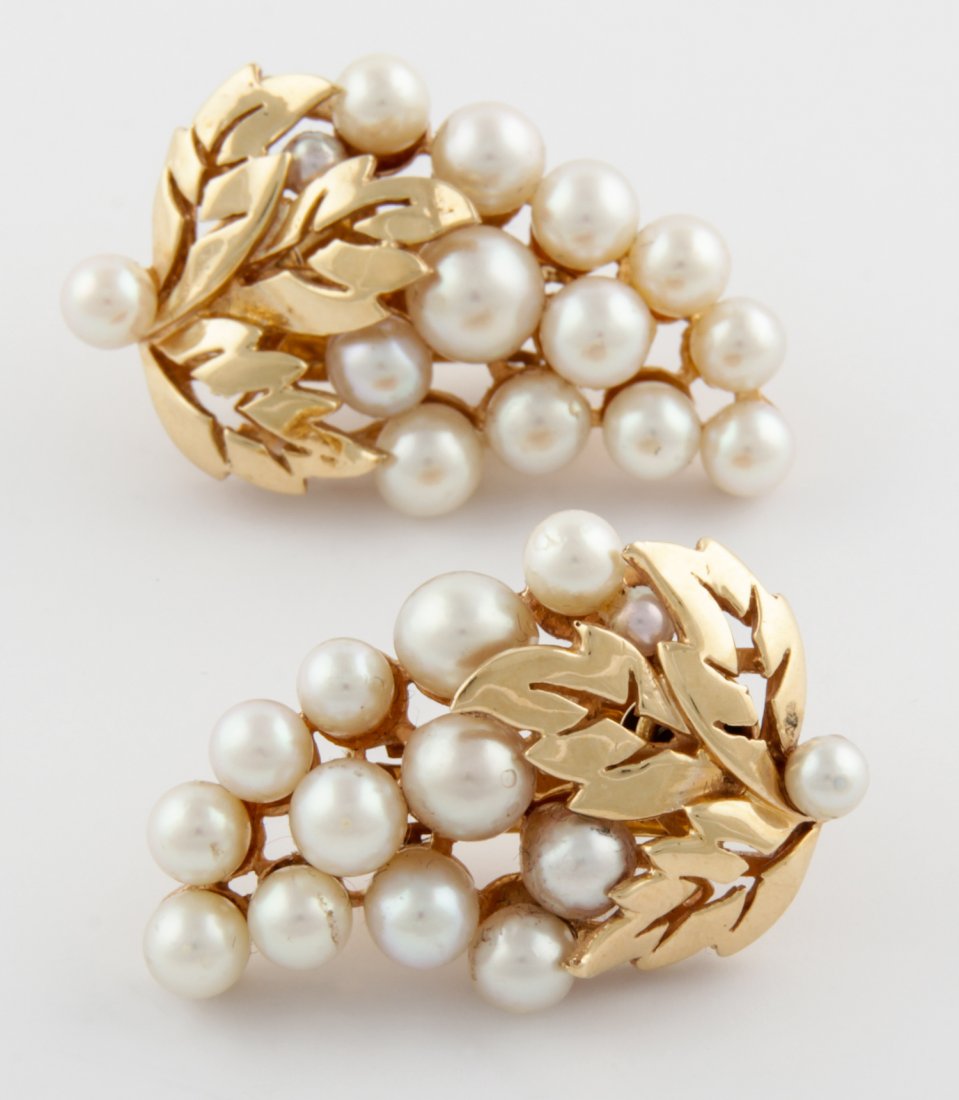 14K Gold and Pearl Earrings: Gold and Pearl Earrings each a bunch of grapes marked 14K. Post-backs with Clips.Size: 1.25"L, 3 cm (each). 20.2 g. Since 1937, the The Silver Shop of Princeton, NJ was located at 59 Palmer Square Wes
