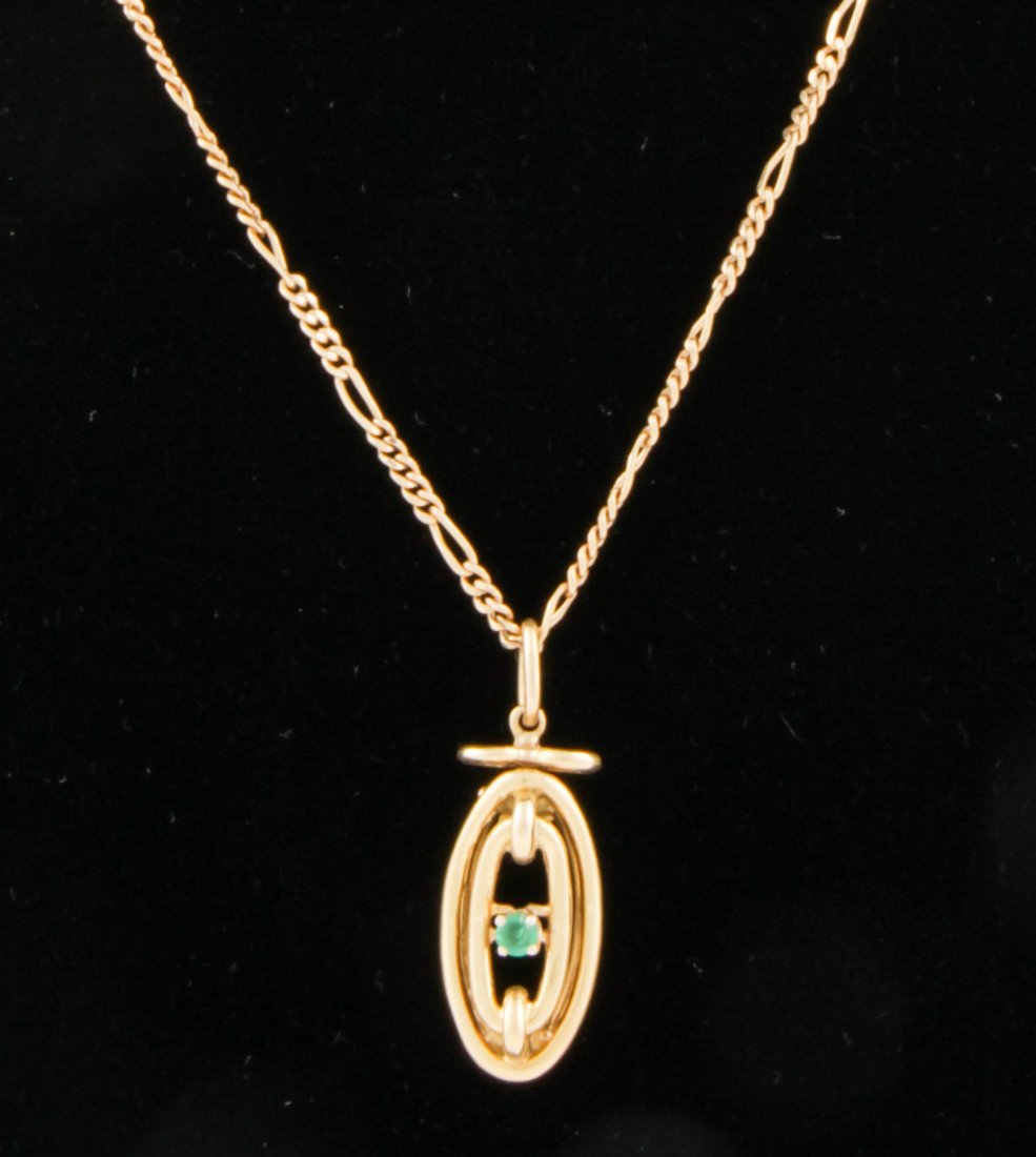 18K Gold and Emerald Pendant Necklace: Gold and Emerald Pendant Necklace marked 18K. Chain 16"L (41 cm). 8.4 g. Since 1937, the The Silver Shop of Princeton, NJ was located at 59 Palmer Square West.