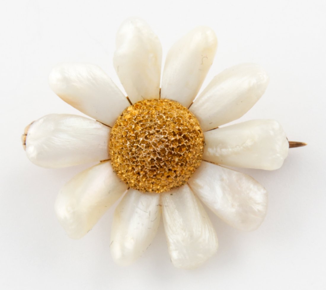 14 K Gold and Pearl Pin: Gold and Pearl Pin. 14K Yellow Gold and Pearls forming classic Daisy Pin. Marked 14K. Size: 3/4"D (2 cm). 3.1 g. Since 1937, the The Silver Shop of Princeton, NJ was located at 59 Palmer Square West.