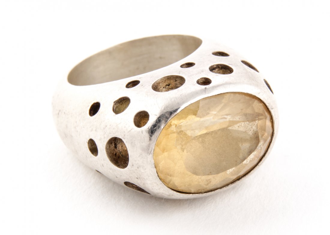 Silver and Citrine Studio Ring: Silver and Citrine Studio Ring. Great Openwork with substantial Gemstone. Inscribed Welden 925. Size 6. Heavy. 0.71 ozt. Since 1937, the The Silver Shop of Princeton, NJ was located at 59 Palmer Squar