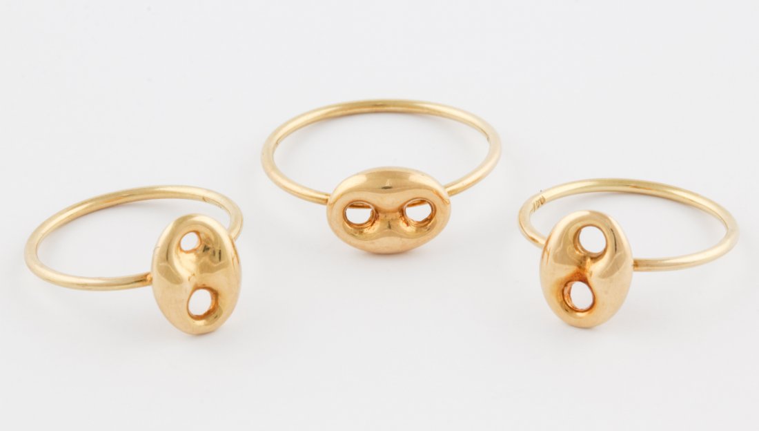 Three Stackable 18K Rings: Three Stackable Rings in 18K topped with Gucci elements marked 750. Sizes 4, 4, 6.5. 0.15 ozt.Since 1937, the The Silver Shop of Princeton, NJ was located at 59 Palmer Square West.