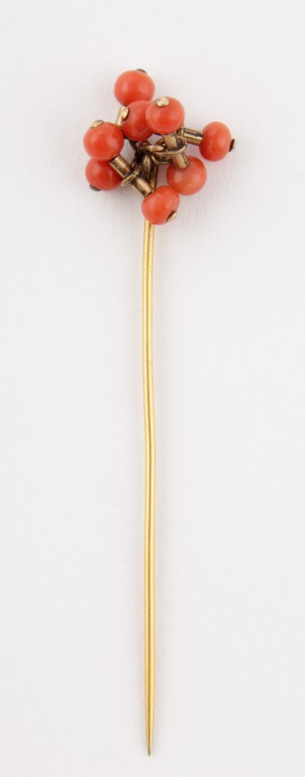 Antique Gold and Coral Stickpin with Articulated Beads: Antique Gold and Coral Stickpin with Articulated Beads to the Pin. 3"L Since 1937, the The Silver Shop of Princeton, NJ was located at 59 Palmer Square West.