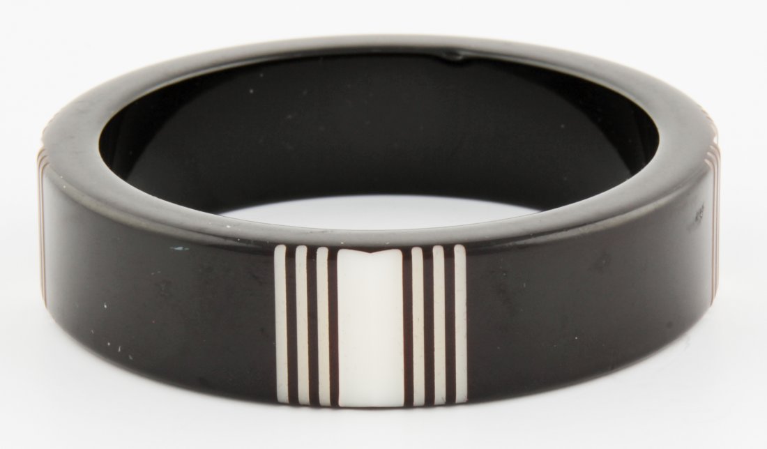 Black and White Etched Art Deco Bangle Bracelet: Black and White etched Art Deco Bangle Bracelet. Size: 3" x 3" (7.5 x 7.5 cm). 39.8 g. Since 1937, the The Silver Shop of Princeton, NJ was located at 59 Palmer Square West.