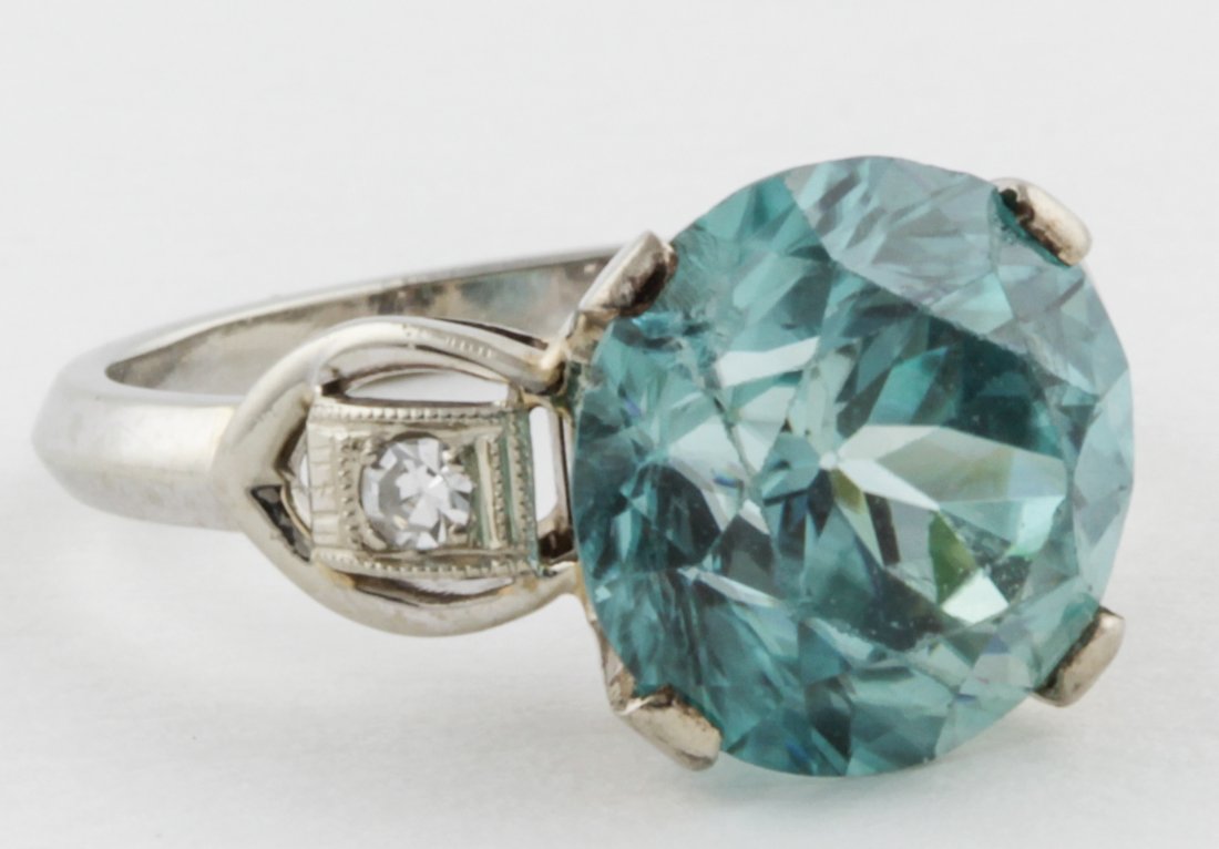 18K White Gold, Diamond and Blue Zircon Ring: Beautiful White Gold, Diamond and Blue Zircon Ring marked 18K. Size 4.5. 4.7 g. Since 1937, the The Silver Shop of Princeton, NJ was located at 59 Palmer Square West.