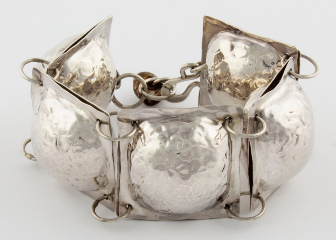 Substantial Hammered Silver Bracelet: Substantial Hammered Silver Bracelet of puffed balls in square frames connected by large rings. Statement piece. 10"L (25 cm). 91. G. Since 1937, the The Silver Shop of Princeton, NJ was located at 59
