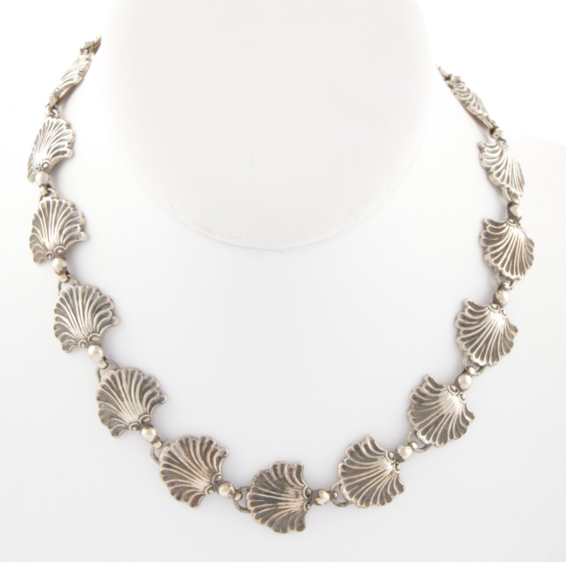 Vintage Ruopoli Silver Shell Necklace: Vintage Ruopoli Silver Shell Necklace marked Sterling. 15"L (38 cm). 47 g. Since 1937, the The Silver Shop of Princeton, NJ was located at 59 Palmer Square West.