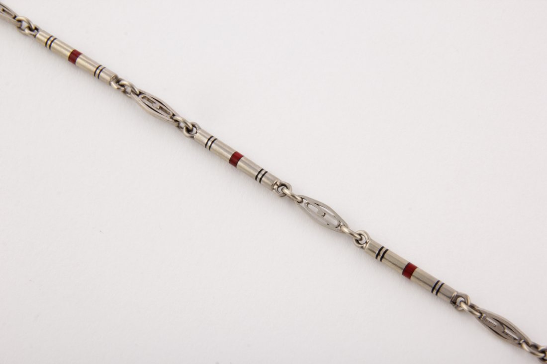 14K White Gold and Enamel Pocket Watch Chain: White Gold and Enamel Pocket Watch Chain. Very Fine Black & Red Enamel Work to the Round Gold Bars marked 14K. 13"L. 0.32 ozt. Since 1937, the The Silver Shop of Princeton, NJ was located at 59 Palmer