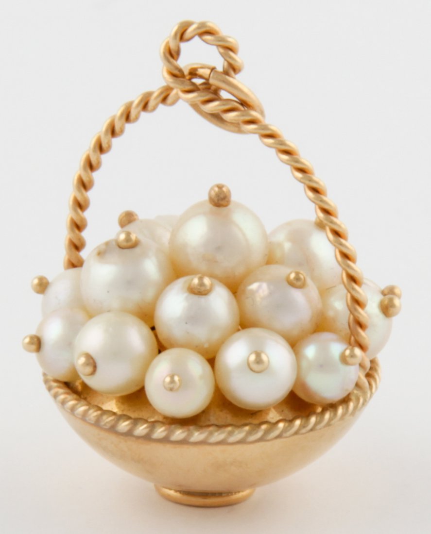 14K Gold and Pearl Basket Pendant: Marvelous Gold and Pearl Basket Pendant marked 14K. Size: 1" x 3/4" (3 x 2 cm). 5.3 g. Since 1937, the The Silver Shop of Princeton, NJ was located at 59 Palmer Square West.