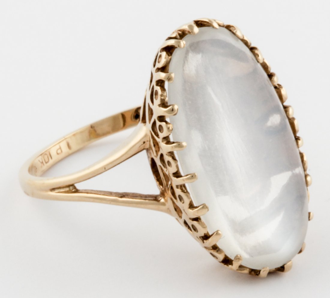 Gold and Moonstone Ring: Gold and Moonstone Ring marked 10K. Size 7. 4.7 g.Since 1937, the The Silver Shop of Princeton, NJ was located at 59 Palmer Square West.