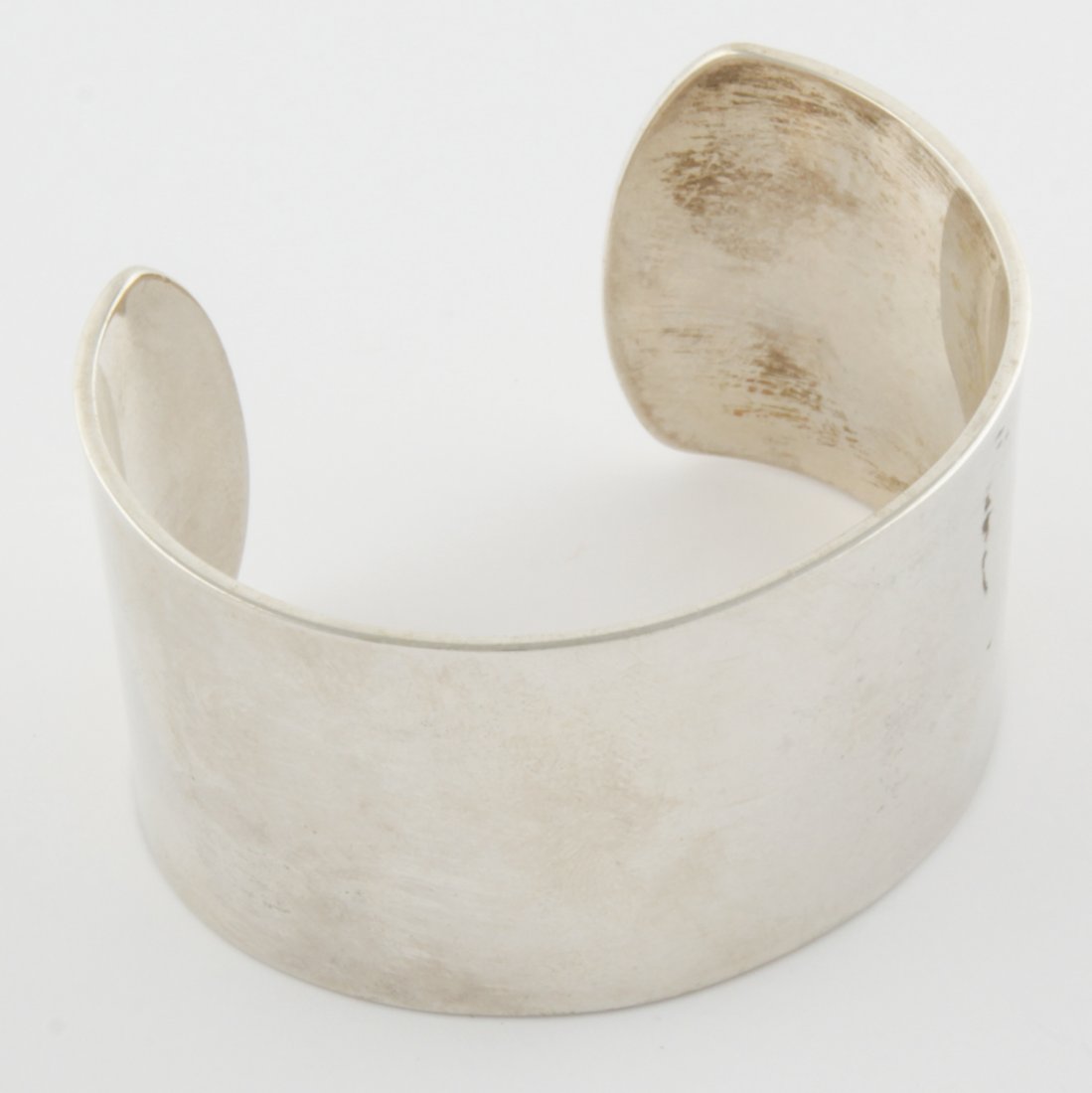 Sterling Silver Cuff Bracelet by Brennan: Sterling Silver Cuff Bracelet by Brennan. Very Heavy. Marked Brennan Sterling. 1.5"H (4 cm). 3.03 ? ozt or gram. Since 1937, the The Silver Shop of Princeton, NJ was located at 59 Palmer Square West.