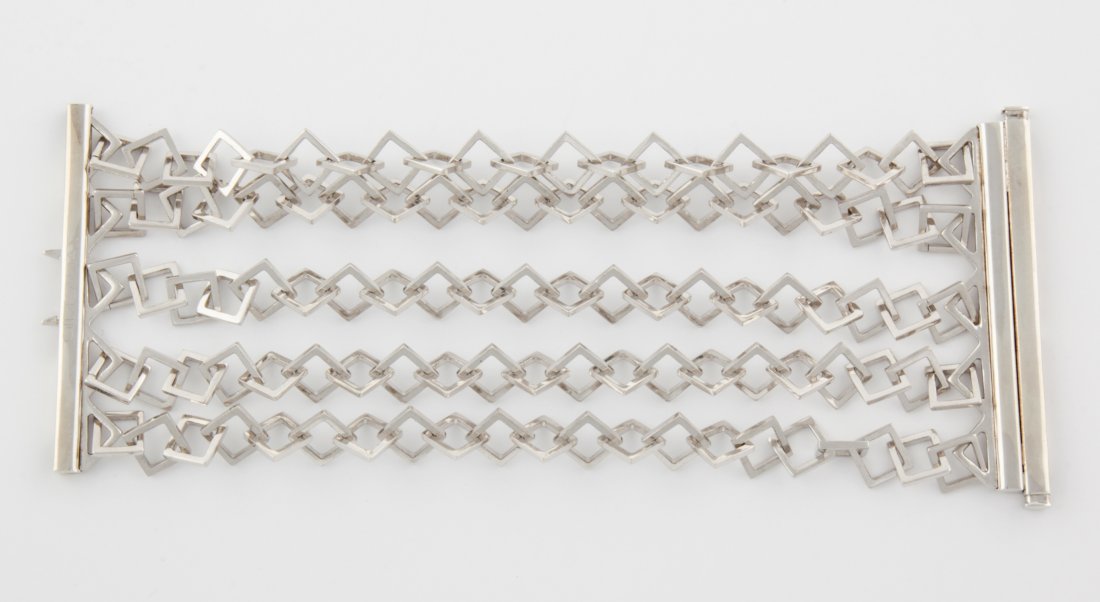 14K White Gold Bracelet by Giuseppe Santomio: White Gold Bracelet by Giuseppe Santomio. Heavy Bracelet crafted into open Square Links forming 5 Chains anchored into Solid Bars functioning as the Clasp. Marked 14K. Original & Unique. 7"L (18 cm). 