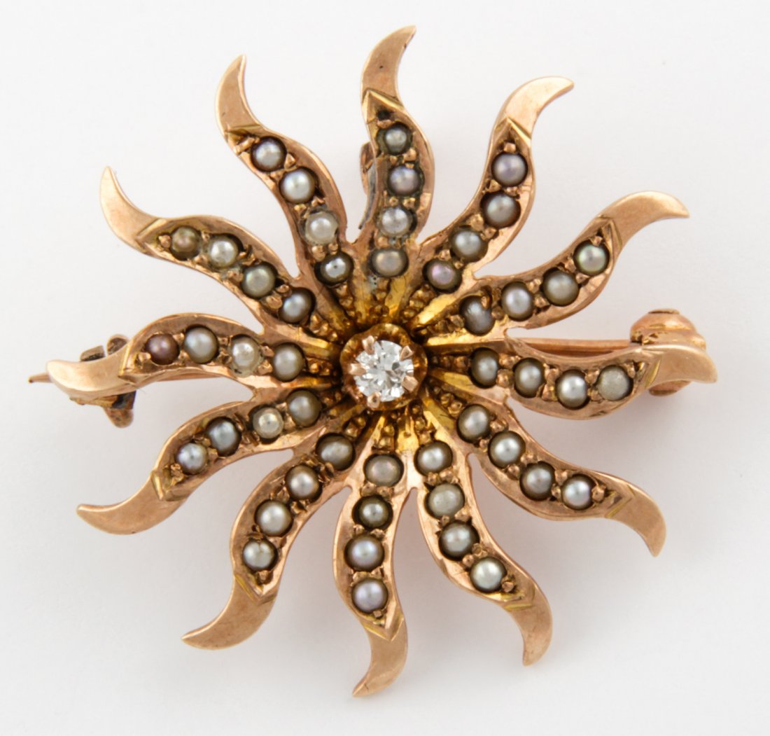 Gold, Seed Pearl and Diamond Sunburst Pin: Gold, Seed Pearl and Diamond Sunburst Pin. Size: 1" x 1" (2.5 x 2.5 cm). 3.1 g. Since 1937, the The Silver Shop of Princeton, NJ was located at 59 Palmer Square West.