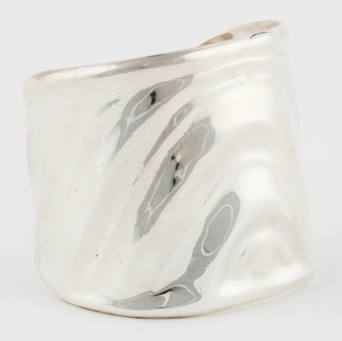 Large and Heavy Silver Cuff Bracelet: Large and Heavy Silver Cuff Bracelet. Mexican. Marked 950. 2.25"H (6 cm). 97.4 g. Since 1937, the The Silver Shop of Princeton, NJ was located at 59 Palmer Square West.