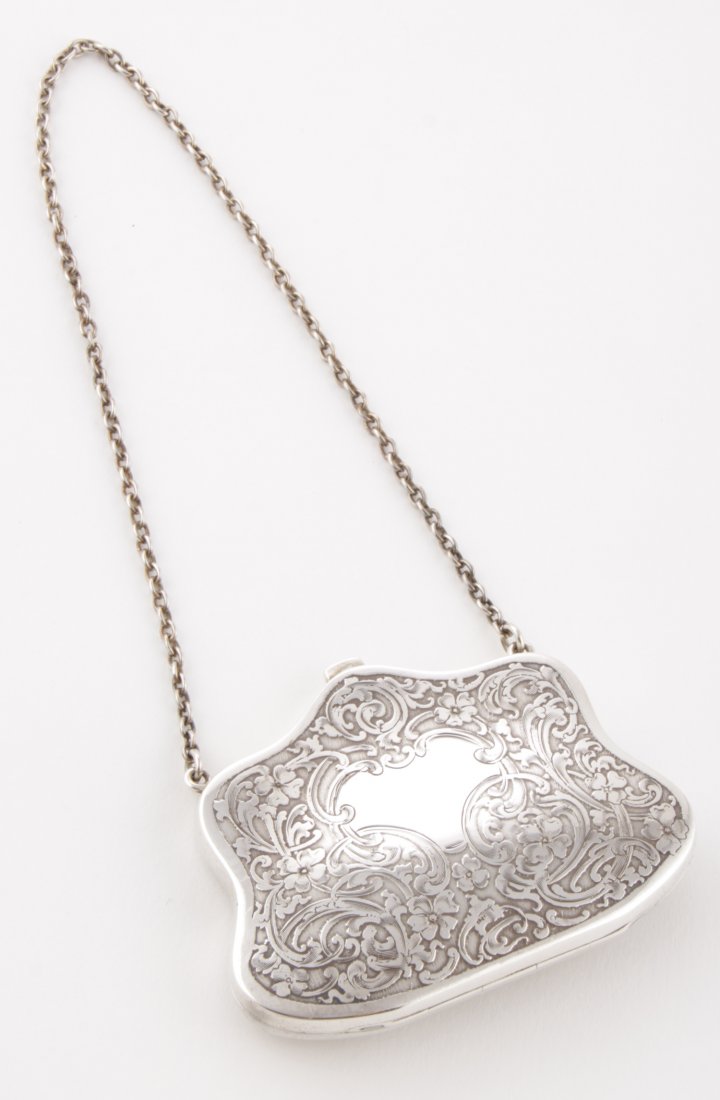 Antique Hand-Chased Silver Purse: Antique Hand-Chased Silver Purse. Marked Sterling. Lining Removed. 3.25" x 2.5". 2.31 ozt. Since 1937, the The Silver Shop of Princeton, NJ was located at 59 Palmer Square West.