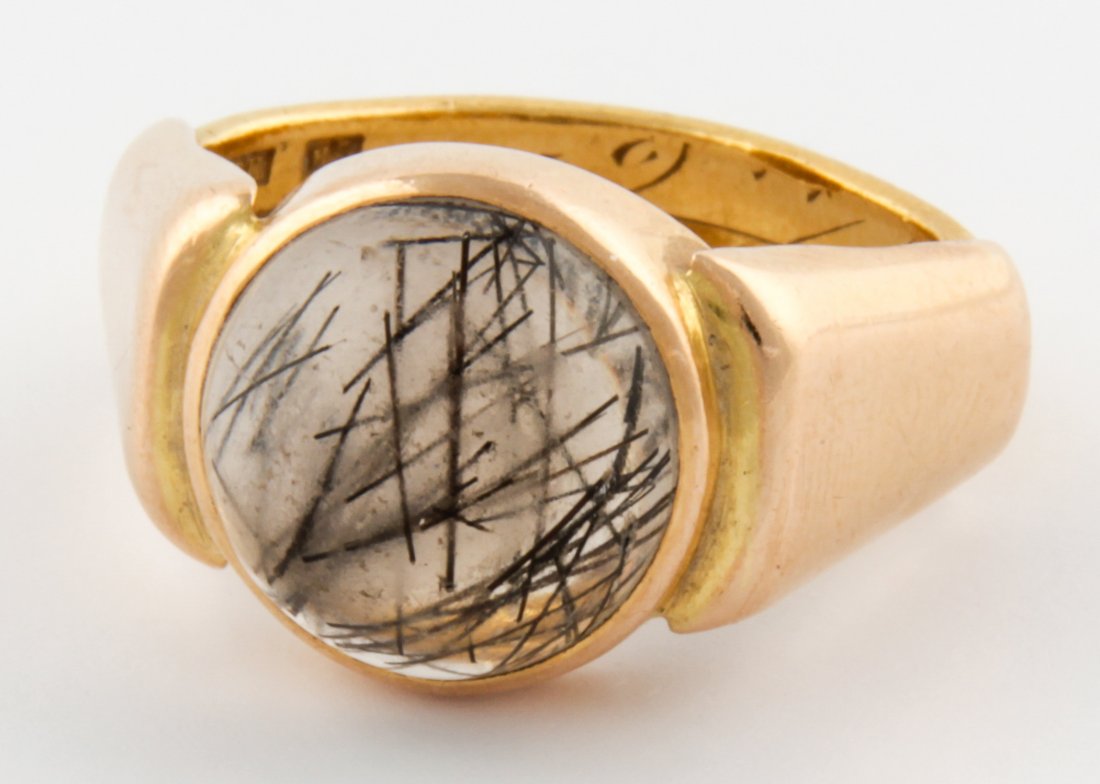 Antique 23 K. Gold and Rutilated Quartz Ring: Antique Gold and Rutilated Quartz Ring marked 23K along with Swedish Hallmarks for Date year 1904. Size 5.5. 9.3 g. Since 1937, the The Silver Shop of Princeton, NJ was located at 59 Palmer Square Wes