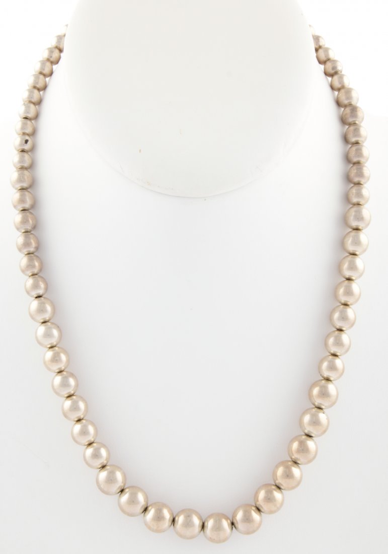 Sterling Silver Beaded Necklace: Sterling Silver Beaded Necklace. 17.5"L (44.5 cm). 29.8 g. Since 1937, the The Silver Shop of Princeton, NJ was located at 59 Palmer Square West.
