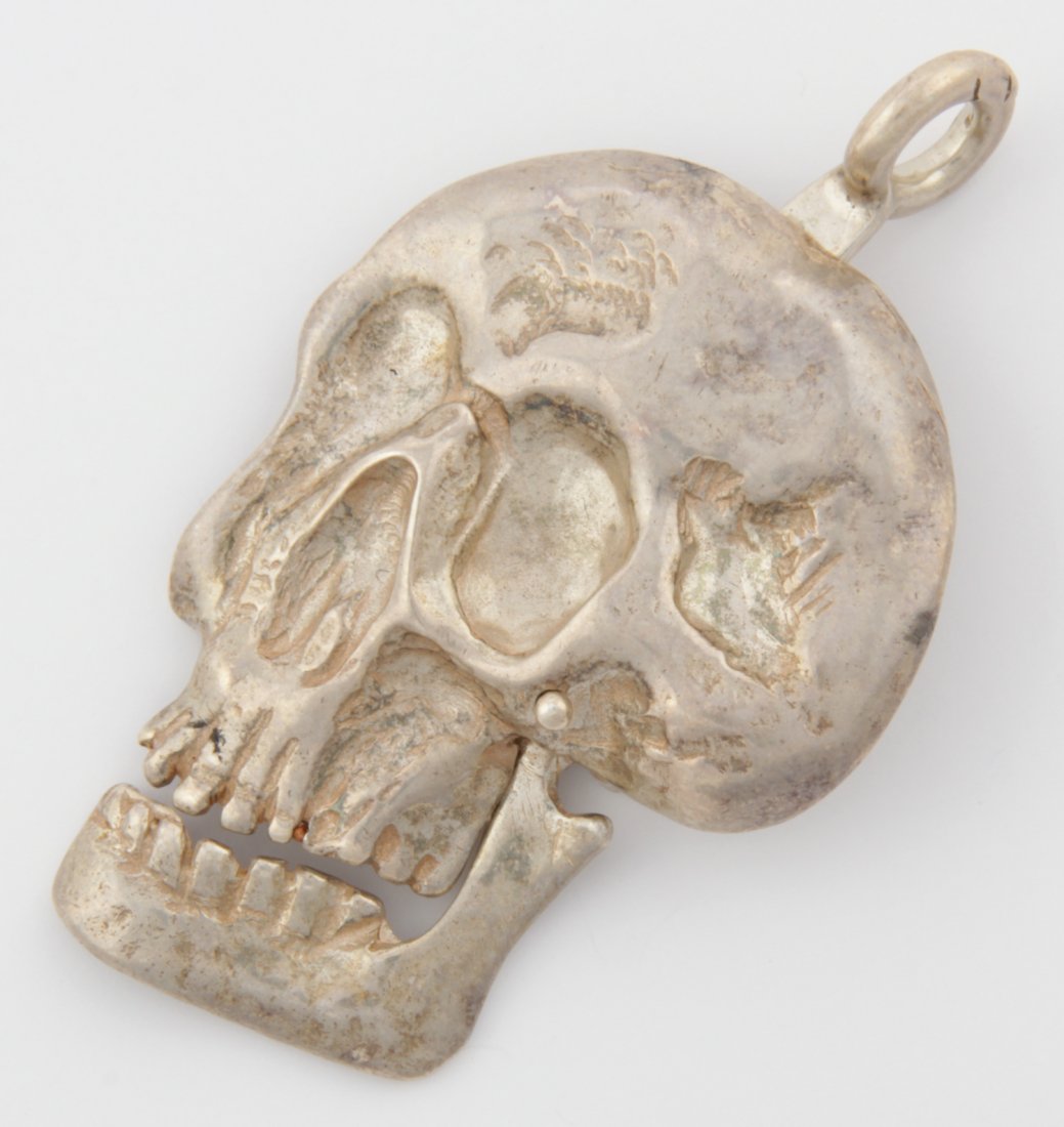 Luna Parc Sterling Silver Pendant of Skull: Luna Parc Sterling Silver Pendant of Skull. Artist Stamp. Size: 2" x 1.25" (5 x 3 cm). 11.5 g. Since 1937, the The Silver Shop of Princeton, NJ was located at 59 Palmer Square West.