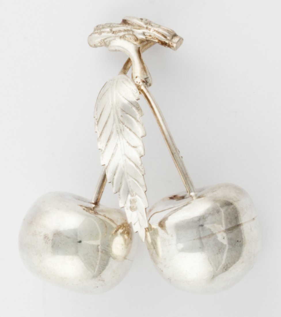 White Gold Bing Cherry Sculpture: White Gold Bing Cherry Sculpture. Perfect rendition of Cherries. Could be mounted as a Statement Brooch with pin and catch. Marked 750. Size: 2.75" x 2.25" x 1" (7 x 6 x 2.5 cm). 38.9 g. Since 1937, t