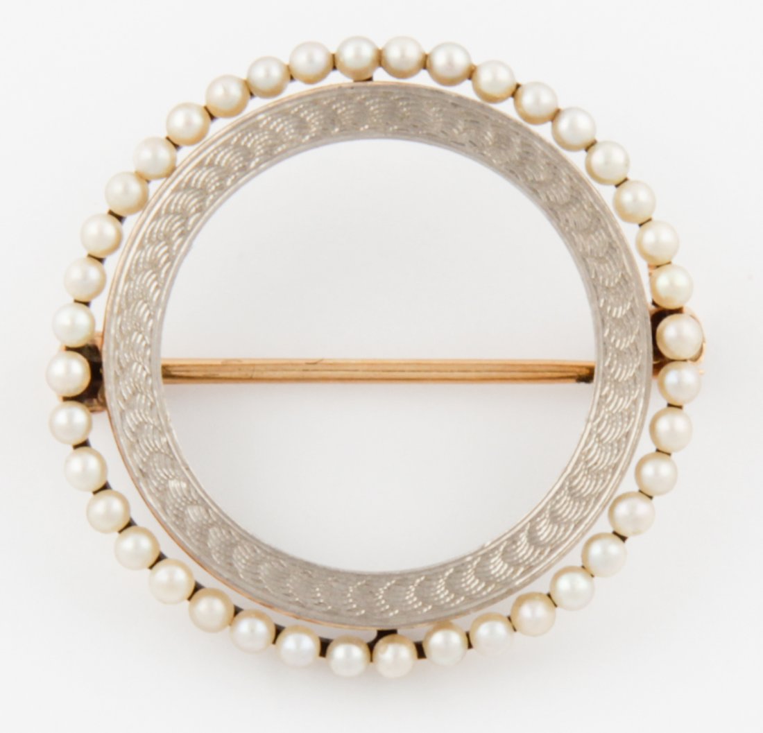 14K Gold and Pearl Circle Pin: Gold and Pearl Circle Pin marked 14K. Size: 3/4"D (2 cm). 2.5 g. Since 1937, the The Silver Shop of Princeton, NJ was located at 59 Palmer Square West.