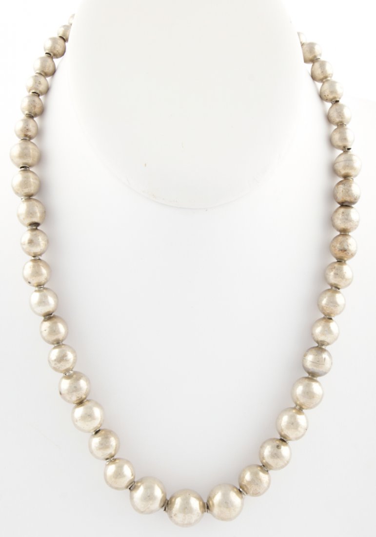 Silver Beaded Necklace: Silver Beaded Necklace. Unmarked. Size: 18"L (46 cm). 25.8 g. Since 1937, the The Silver Shop of Princeton, NJ was located at 59 Palmer Square West.