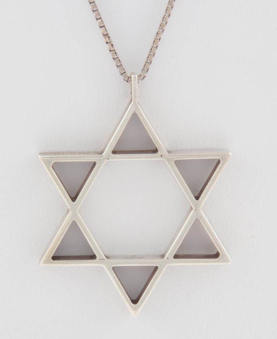Gucci Six-Sided Star of David Pendant and Necklace: Gucci Six-Sided Star of David Pendant and Necklace marked 925. Size: 18"L, 46 cm (necklace); 1.25"D, 3 cm (pendant). 8.4 g. Since 1937, the The Silver Shop of Princeton, NJ was located at 59 Palmer Sq