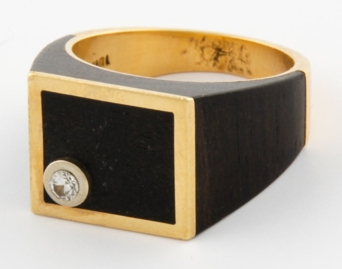 18K Gold, Ebony and Diamond Ring: Gold, Ebony and Diamond Ring marked 18K. Size 6. 7.5 g.Since 1937, the The Silver Shop of Princeton, NJ was located at 59 Palmer Square West.