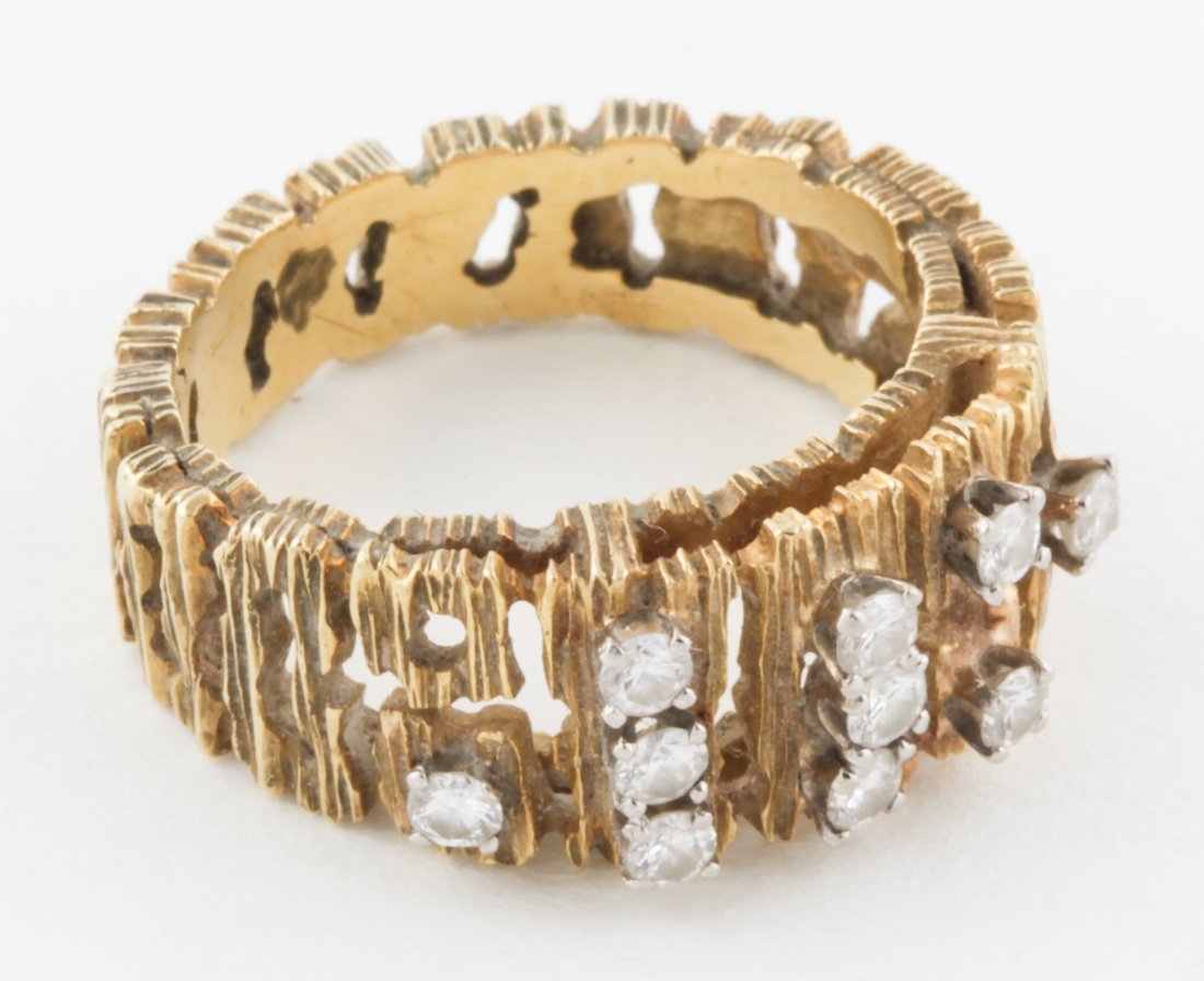 Brutalist Style 14K Gold and Diamond Ring: Brutalist Style 14K Gold and Diamond Ring with 10 Round Diamonds set randomly on top of Studio-Carved Band. Size 6. 7.5 g. Since 1937, the The Silver Shop of Princeton, NJ was located at 59 Palmer Squ