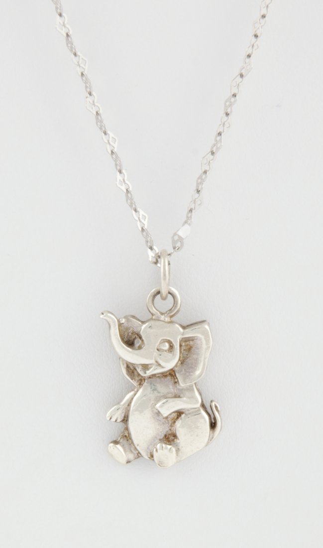 Sterling Silver Elephant Pendant Necklace: Sterling Silver Elephant Pendant Necklace marked 925S. 19"L (48 cm). 4.3 g. Since 1937, the The Silver Shop of Princeton, NJ was located at 59 Palmer Square West.