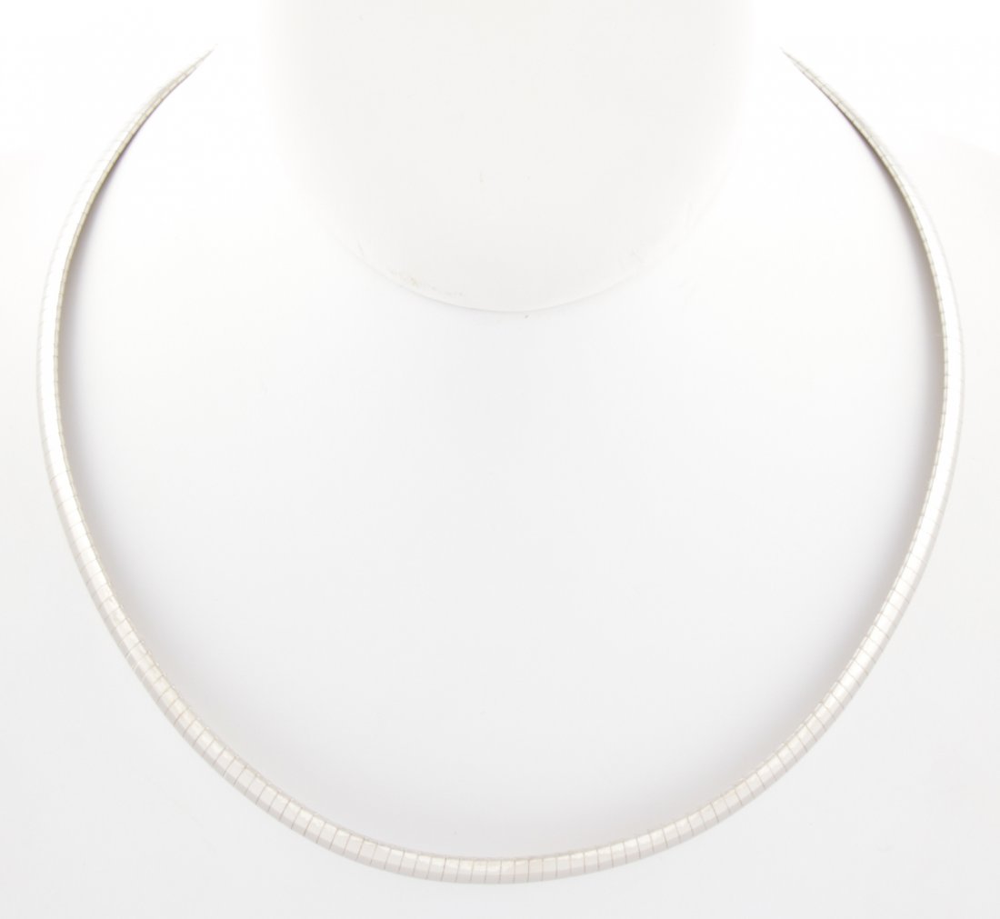 Sterling Silver Omega Necklace: Sterling Silver Omega Necklace marked 925 Italy. 17"L (43 cm). 28 g. Since 1937, the The Silver Shop of Princeton, NJ was located at 59 Palmer Square West.