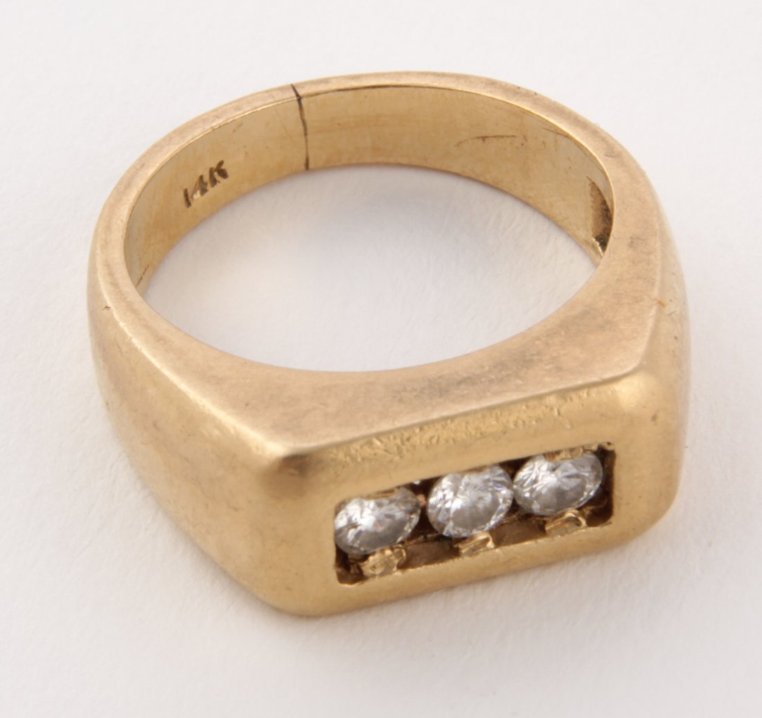 Gent's 14K Gold and Diamond Ring: Gent's Gold and Diamond Ring marked 14K. Size 8. 0.33 ozt. Since 1937, the The Silver Shop of Princeton, NJ was located at 59 Palmer Square West.