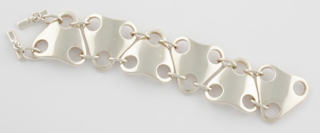 Georg Jensen Sterling Silver Regitze Bracelet: Georg Jensen Sterling Silver Regitze Bracelet marked 925 S 465. Contemporary and Very Heavy. 4 Oz. 7.5"L (19 cm). 124.1 g. Since 1937, the The Silver Shop of Princeton, NJ was located at 59 Palmer Squ