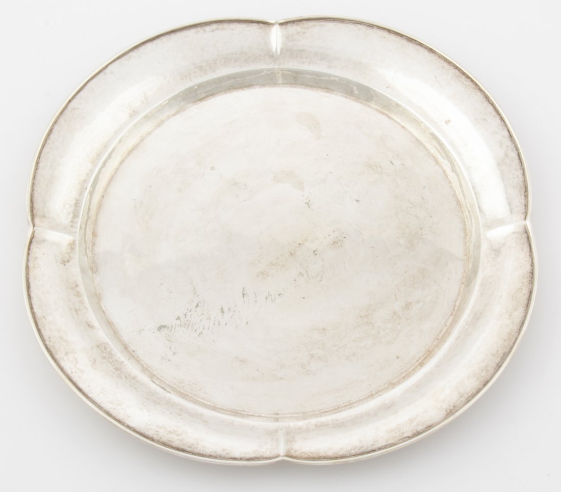 Lebolt Hand Beaten Silver Tray: Lebolt Hand Beaten Silver Tray. Early 20th C Four-Lobed Round Tray. Thick, Heavy applied Wire to the Broad Border marked Sterling 805. Great Balance. Size: 1" x 14" x 14" (3 x 36 x 36 cm). 25.33 ozt.S