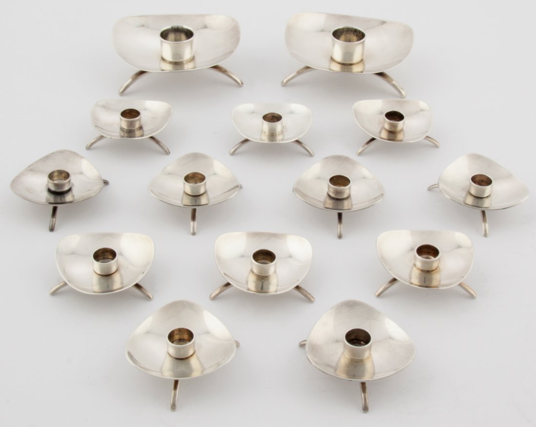 Group of 14 Cohr Taper Candle Holders: Group of 14 Cohr Taper Candle Holders. Huge Matched Set 12 Small and 2 Large Candlesticks. High Quality Danish Mod Style. 3 Down-Turned Legs and Undulating Drip Cups give this appeal. All marked Sterl