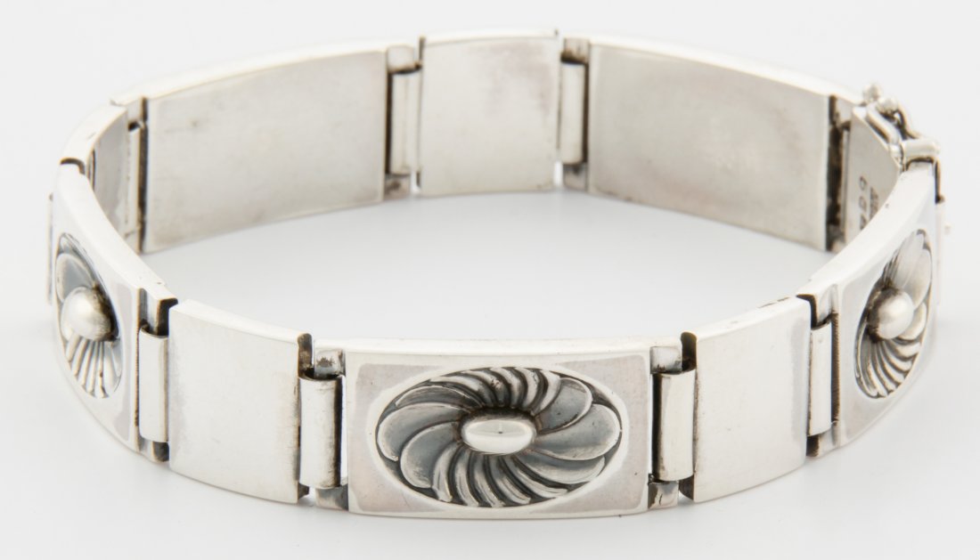 Georg Jensen Silver Bracelet: Georg Jensen Silver Bracelet marked Sterling 56A. 7.5"L, 19 cm. 46.7 g.Since 1937, the The Silver Shop of Princeton, NJ was located at 59 Palmer Square West.