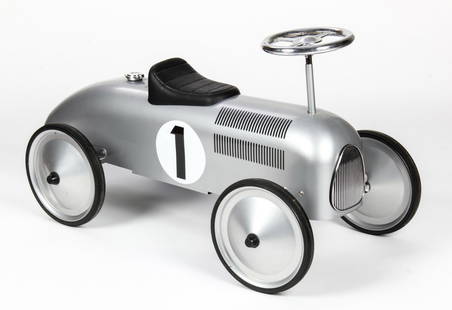 Babystyle Classic Cruiser Straddle Toy Roadster: Babystyle Classic Cruiser Straddle Toy Roadster. Stamped and painted metal. Fully functional steering wheel. Used as a store display. Size: 16" x 30" x 14" (40 x 76 x 35 cm).Since 1937, the The