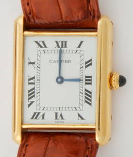 Gent's Cartier Watch: Gent's Cartier Watch. Yellow Gold with Cabochon Sapphire to the Stem. Manual Wind marked 18K Swiss, Paris, 7808612132, 60001. Genuine 18K Cartier Buckle to the Crocodile Strap marked 750. 