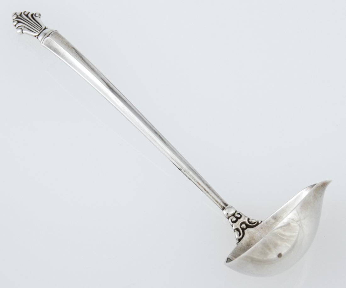 Georg Jensen Silver Cream Sauce Ladle in the "Acanthus": Georg Jensen Silver Cream Sauce Ladle in the "Acanthus" Pattern marked Sterling Denmark. 5"L (13 cm). Weight: 22.5 g. Since 1937, the The Silver Shop of Princeton, NJ was located at 59 Palmer Square W