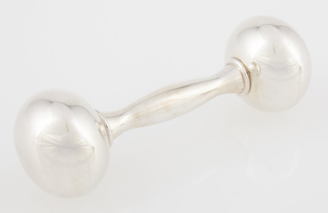 Handmade Sterling Silver Rattle: Handmade Sterling Silver Rattle marked 925. Heavy. Size: 4.5" x 1.75" (11 x 4 cm). 79.4 g. Weight: 60 g. Since 1937, the The Silver Shop of Princeton, NJ was located at 59 Palmer Square West.