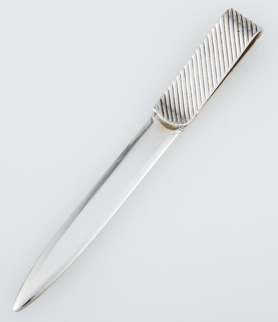 Sterling Silver Letter Opener marked 925 Italy: Sterling Silver Letter Opener marked 925 Italy. 6.5"L (17 cm). Heavy. Weight: 59 g. Since 1937, the The Silver Shop of Princeton, NJ was located at 59 Palmer Square West.