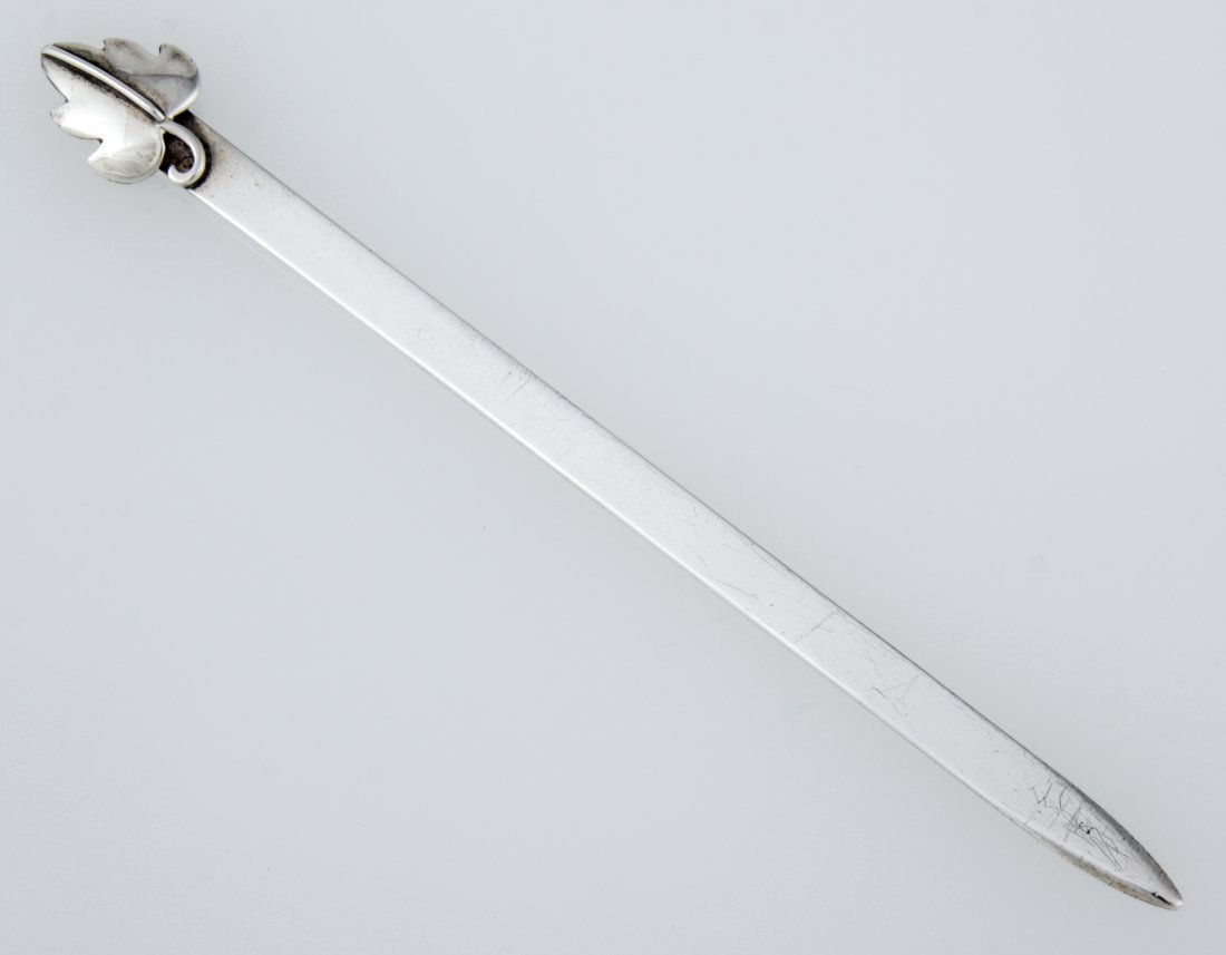 Leonore Doskow Handmade Sterling Letter Opener: Leonore Doskow Handmade Sterling Letter Opener. 5.5"L (14 cm). Weight: 10.8 g. Since 1937, the The Silver Shop of Princeton, NJ was located at 59 Palmer Square West.
