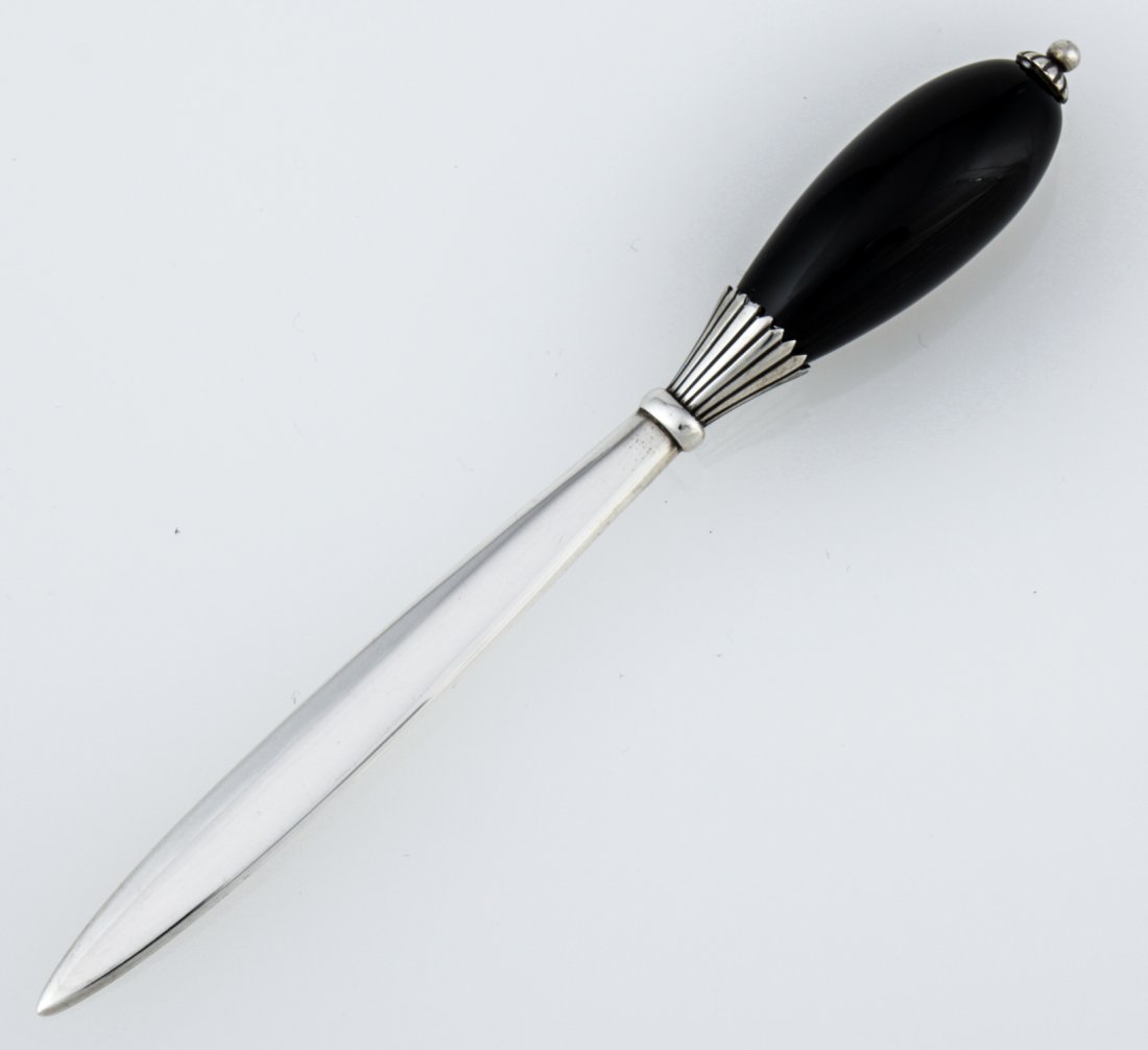 Georg Jensen Sterling Silver and Onyx Letter Opener: Georg Jensen Sterling Silver and Onyx Letter Opener marked 925S Denmark 202. 4.75"L (12 cm). Weight: 21.5 g. Since 1937, the The Silver Shop of Princeton, NJ was located at 59 Palmer Square West.