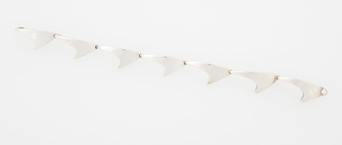 Bent Knudsen Silver Bracelet: Bent Knudsen Silver Bracelet marked Sterling Denmark. 8"L (20.5 cm). Weight: 31.3 g.Since 1937, the The Silver Shop of Princeton, NJ was located at 59 Palmer Square West.