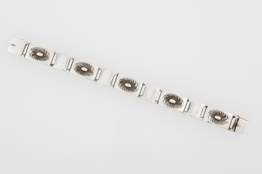 Georg Jensen Silver Bracelet: Georg Jensen Silver Bracelet marked 925S Denmark 56A. 7.5"L (19 cm). Weight: 46.4 g. Since 1937, the The Silver Shop of Princeton, NJ was located at 59 Palmer Square West.