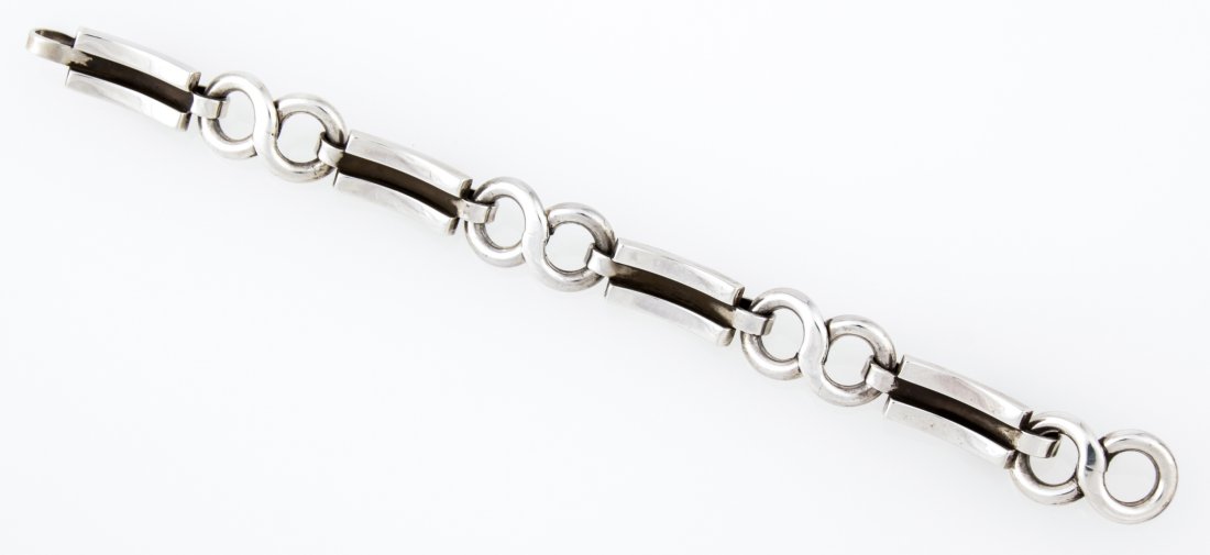 Jensen USA Handmade Silver Bracelet marked Sterling: Jensen USA Handmade Silver Bracelet marked Sterling. 7.25"L (18 cm). Weight: 45.9 g. Since 1937, the The Silver Shop of Princeton, NJ was located at 59 Palmer Square West.