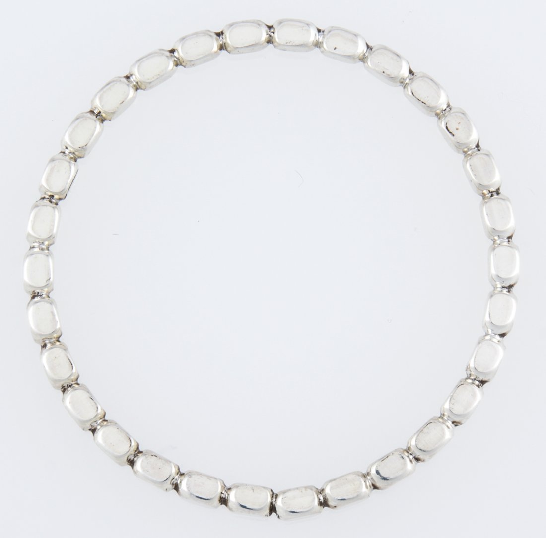 Jensen USA Silver Bangle Bracelet: Jensen USA Silver Bangle Bracelet marked Sterling. 2.75"D (7 cm). Weight: 32 g. Since 1937, the The Silver Shop of Princeton, NJ was located at 59 Palmer Square West.