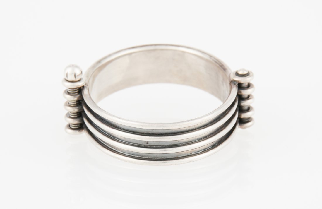 Handmade Silver Bracelet: Handmade Silver Bracelet marked Denmark 925. 2.25"D (6 cm). Weight: 49.7 g. Since 1937, the The Silver Shop of Princeton, NJ was located at 59 Palmer Square West.