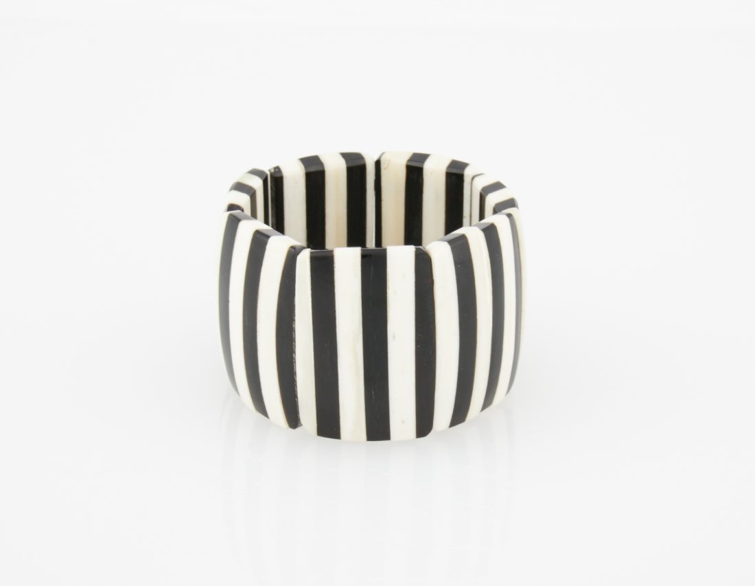 Handmade Striped Bone Bracelet: Handmade Striped Bone Bracelet. 1.75"H x 2.75"D (4 x 7 cm). Weight: 95 g. Since 1937, the The Silver Shop of Princeton, NJ was located at 59 Palmer Square West.